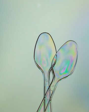 Colorful two plastic spoons, photo elasticity styleの写真素材