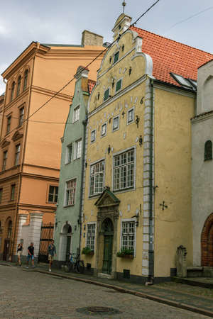 Riga, Latvia- June 29 2020: Three brothers is the oldest dwelling complex in Riga. It's been constructed at the end of 15th century, when Riga has established contacts with merchants from Netherlands and as a result some characteristics of architecture ofのeditorial素材