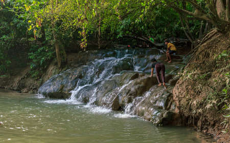 Krabi town, Thailand- March 28 2019: Klong Thom hot springs waterfall. The water from these springs actually comes from thermal springs that originate from the underground volcanic chambers. The water temperatures are about 35 - 42 degrees Celsiusのeditorial素材