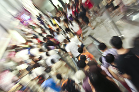 Crowd inside subway train station in motion blur abstract effect の写真素材