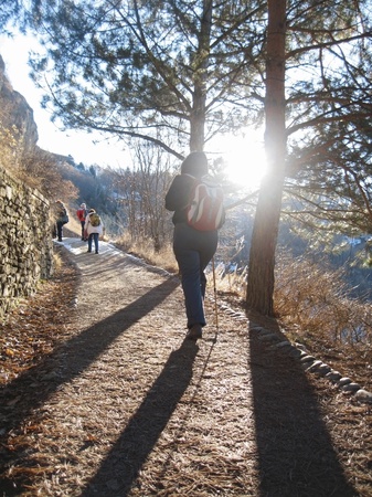 Team of tourists going for track. Winter Caucasの写真素材