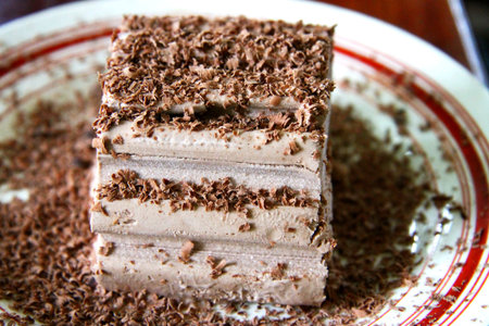 Chocolate ice cream and hardered chocolate over
