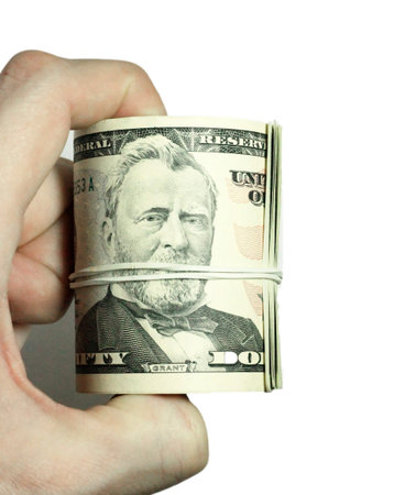 Mans hand holding a stacks of paper dollars USA on the white background