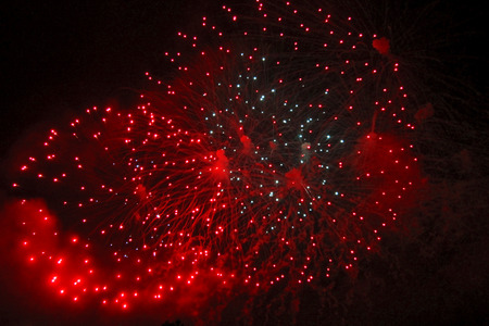 Celebrating firework in the black night skyの写真素材