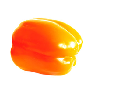 Red and orange sweet pepper isolated on white backgroundの写真素材
