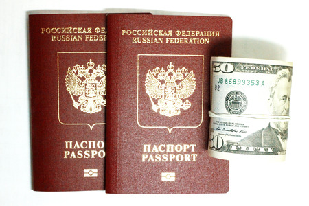 Russian Passport And Dollars USA Isolated On White Backgroundの写真素材
