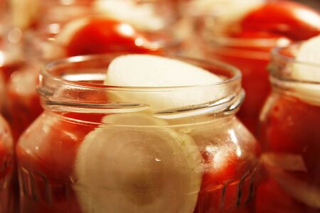 Tasty Tomatoes With Onion Canned In Glass Jarsの写真素材