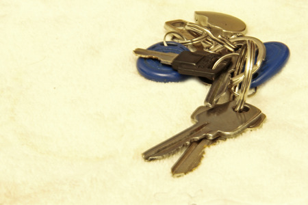 Bunch of keys isolated on the white backgroundの写真素材