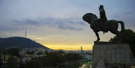 The Vahtang Gorgasali statue blessed in Metekhi, Tbilisi, Georgia in the eveningの写真素材