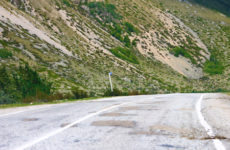 Mountain highway through the forest landscape. North Caucasus travel