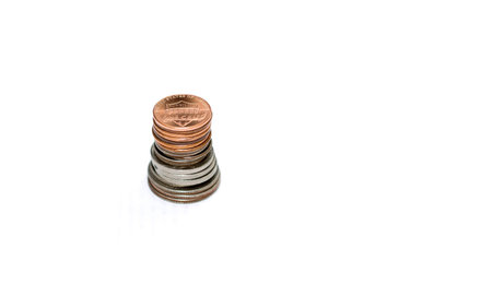 Some modern coins of USA placed in stack isolated on the white background