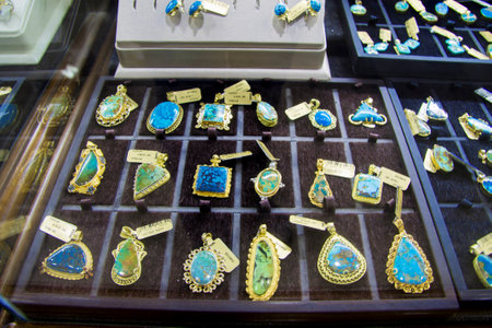 Jewelry hanging with blue stone on the shelf of jewerely store Turkey 27 september 2019のeditorial素材