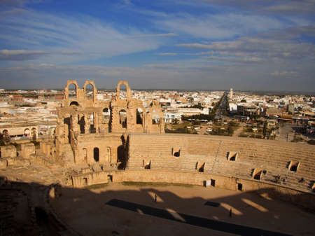 General arial view of Coliseum of El Jem Tunisia and modern town background. Ancient amphitheater in North Africa 13 oct 2018のeditorial素材