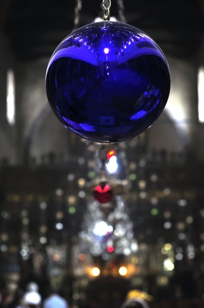 Interior of the Church of the Nativity reflected in a blue ballの写真素材