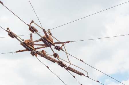 Trolley Bus lines crossing, over the skyの写真素材