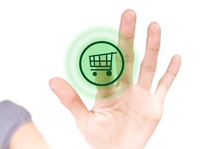Finger pressing green buy shop button on white touchscreenの写真素材