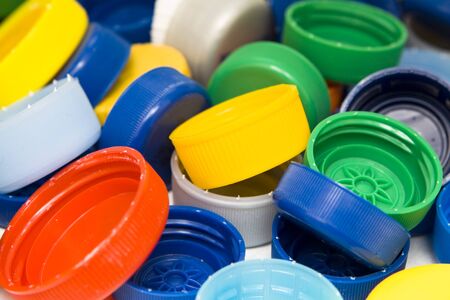 Lots of colorful plastic caps. Shot in studio.の写真素材