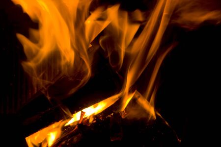 flames dance in fireplace の写真素材