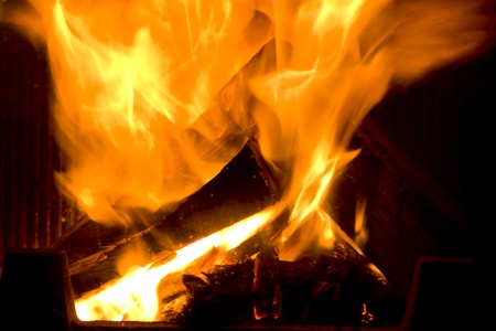 flames dance in fireplace の写真素材