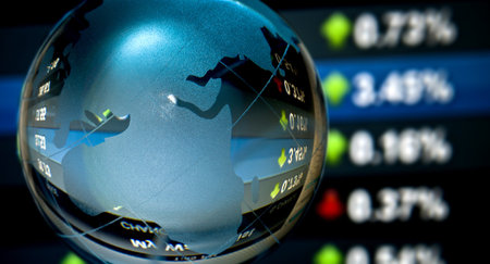 Glass globe over stock data on computer screen