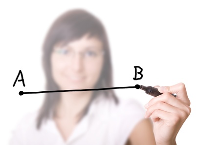 Woman drawing a line from point A to point B  selective focus   Businesswoman with pen in virtual whiteboard の写真素材