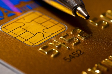 Close-up of silver digits on a credit card の写真素材