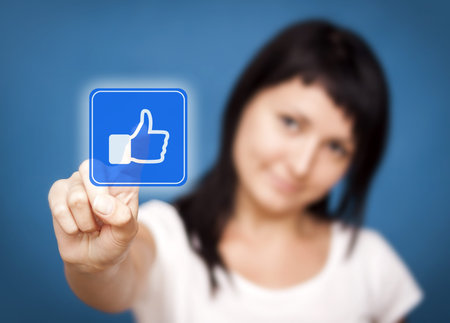 Woman is touching the like button - Social Media 