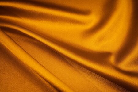 luxurious gold satin background closse upの写真素材