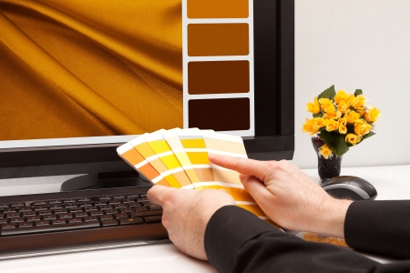 Graphic designer at work  Color samples  Brown, yellow imagesの写真素材