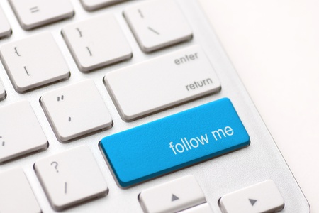 Follow Me button on the key of a computer keyboard の写真素材