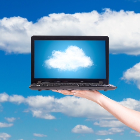 Picture of cloud from laptop screen under blue skyの写真素材