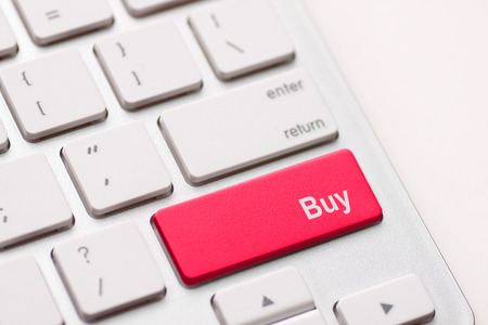 buy key on keyboard showing ecommerce or commerce conceptの写真素材