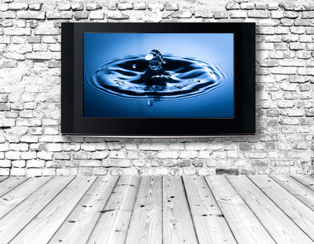 interior with a television set on an old wall