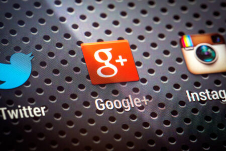 BELCHATOW, POLAND - APRIL 10, 2014  Closeup photo of Google Plus icon on mobile phone screen  Popular social network のeditorial素材