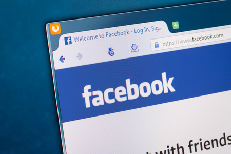 BELCHATOW, POLAND - APRIL 11, 2014  Photo of Facebook social network homepage on a monitor screen のeditorial素材