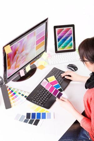 Graphic designer at work. Color swatch samples.の写真素材