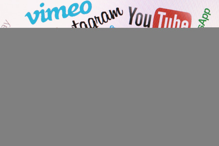 BELCHATOW, POLAND - DECEMBER 28, 2014: Popular social media website logos on computer screenのeditorial素材