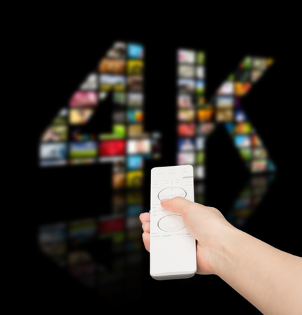 Television 4k resolution technology concept isolated on black.の写真素材