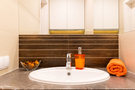 Close up of a wash basin in a modern bathroom interior.の写真素材
