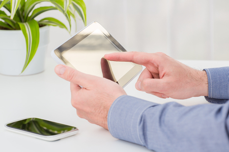 Businessman office worker using touchpad.の写真素材