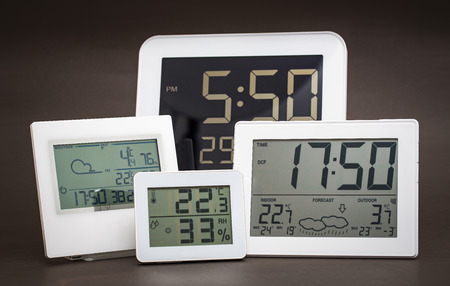 Weather station device with weather conditions. Gray background.の写真素材