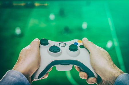 gaming game play tv fun gamer gamepad guy controller video console playing player holding hobby...