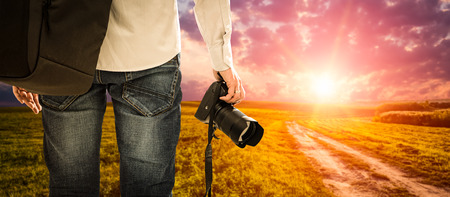 photographer photographic camera dslr photo person passion outdoor photographing travel make photography sunset sky background space banner concept - stock imageの写真素材