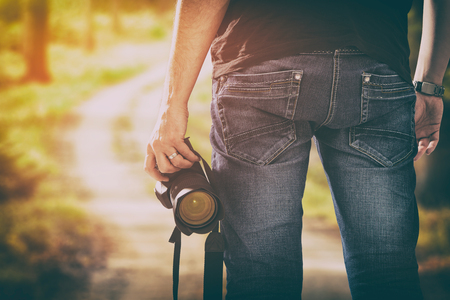 photographer photographic camera dslr photo person passion outdoor photographing travel make photography sunset sky background space banner concept - stock imageの写真素材