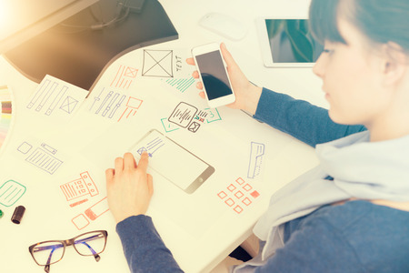 Designer woman drawing website ux app development. User experience concept.の写真素材