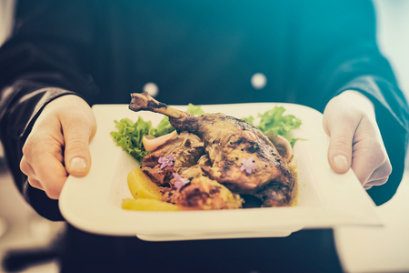 chef cooking restaurant food dish dine fine plate serve hotel garnish gourmet molecular prepare culinary holding decorating concept - stock imageの写真素材