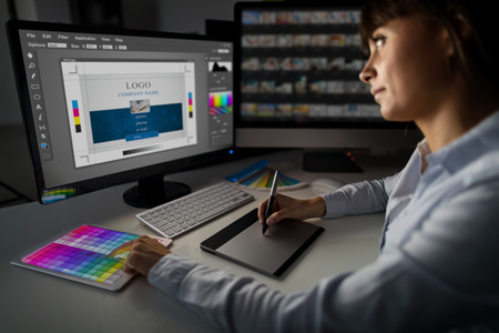 Graphic designer at work. Color swatch samples.の写真素材