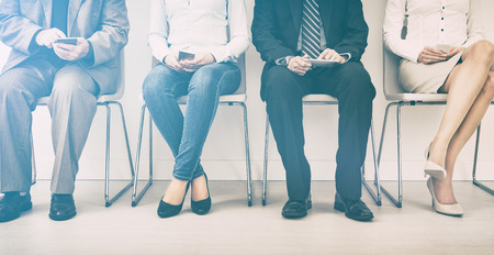 hire employment employ interview candidate hiring legs business waiting cv women sitting queue group employer elegant executive caucasian female male indoors men colleague room concept - stock imageの写真素材