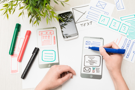 Designer woman drawing website ux app development. User experience concept.の写真素材