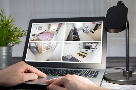 home camera cctv monitoring monitor smart house video system hand exterior closeup concept - stock imageの写真素材